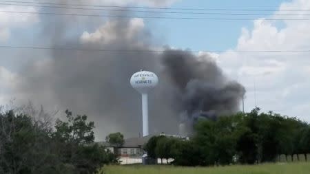 Smoke rises above the Coryell Memorial Hospital in Gatesville, Texas, U.S., June 26, 2018 in this picture obtained from social media. GLENN JONES/via REUTERS