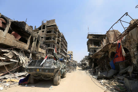 An armored vehicle of Federal police is seen in the Old City of Mosul, Iraq July 9, 2017. REUTERS/Alaa Al-Marjani