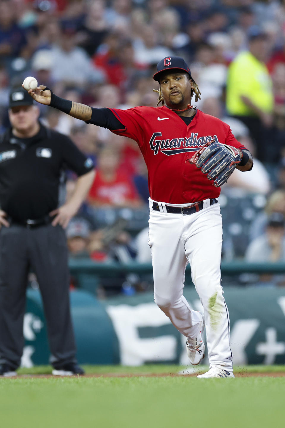 Cleveland Guardians third baseman Jose Ramirez throws out Houston Astros' Jose Altuve at first base during the fourth inning of a baseball game Thursday, Aug. 4, 2022, in Cleveland. (AP Photo/Ron Schwane)