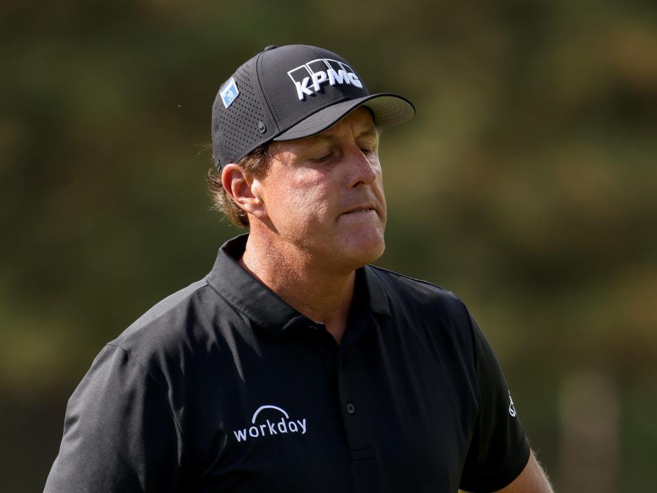 Phil Mickelson reacts to bad shot.