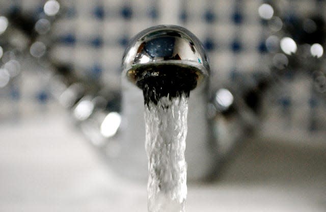 Water flowing from a tap