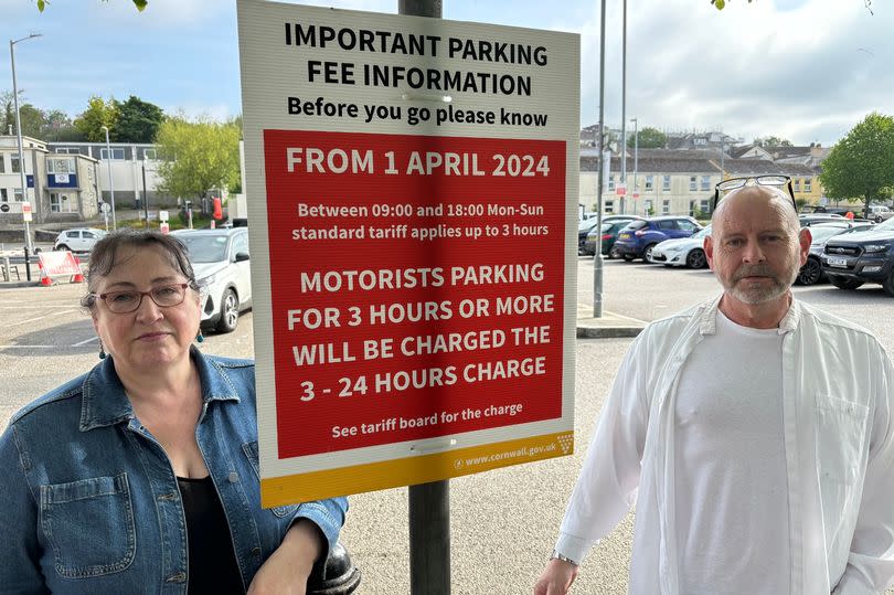 Couple Margaret Georgiou and Spencer Morris, who run separate businesses in St Mary's Mews, are appalled by the £31.50 charge in Truro's Old Bridge Street car park