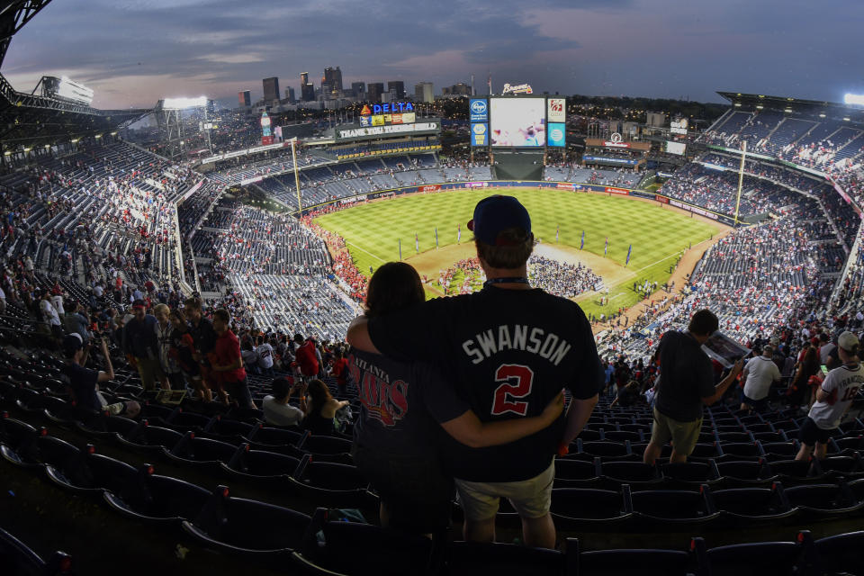 FILE - Fans watch the festivities after a baseball game between the Detroit Tigers and the Atlanta Braves at Turner Field, the final Braves game at the ballpark, in Atlanta on Sunday, Oct. 2, 2016. When Georgia State moved into the ballpark formerly known as Turner Field, they were hoping for a day such as this. A Power 5 opponent taking the field at the Panthers' house. North Carolina (2-0) of the Atlantic Coast Conference will be in Atlanta on Saturday to face Georgia State (0-1), a school that only launched its football program a dozen years ago. (AP Photo/John Amis, File)