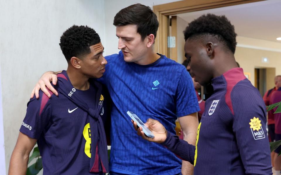 Bukayo Saka chats with Harry Maguire and Jude Bellingham