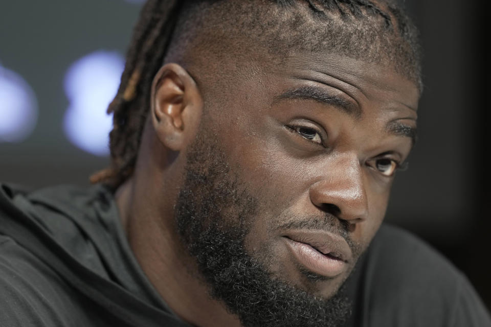 Baltimore Ravens linebacker David Ojabo attends a press conference after an NFL practice session in London, Thursday, Oct. 12, 2023 ahead the NFL game against Tennessee Titans at the Tottenham Hotspur Stadium on Sunday. (AP Photo/Kin Cheung)