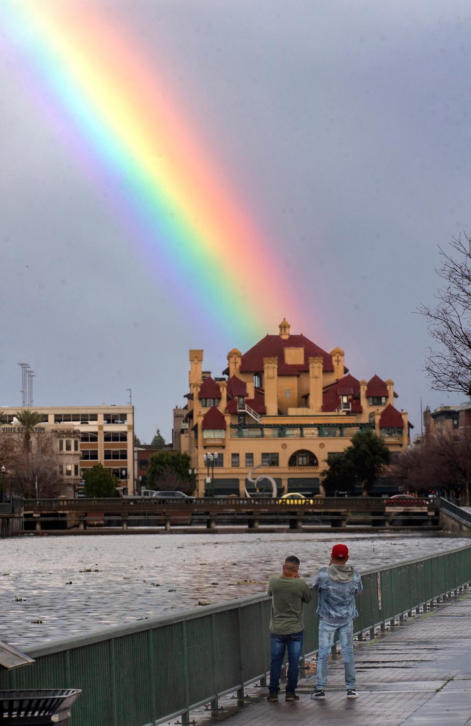 A rainbow appeared over the Hotel Stockton during a break between storms in downtown Stockton on Tuesday, Jan. 10, 2023. 