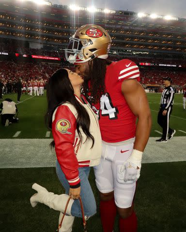 <p>Sydney Warner Instagram </p> Fred Warner and Sydney Warner after a game in Levi's Stadium.