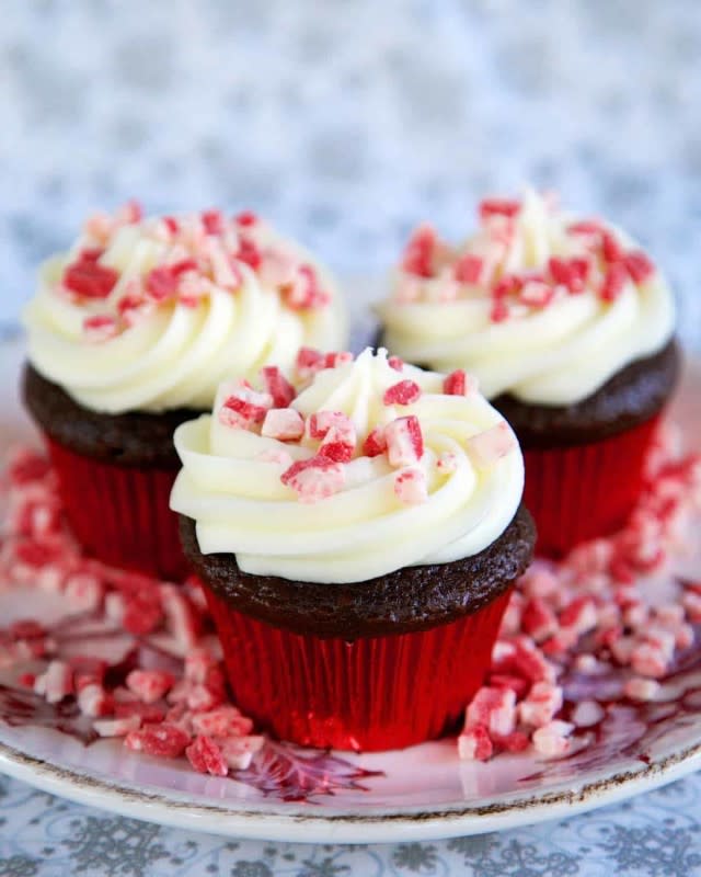 <p>Plain Chicken</p><p>What is the surprise you ask? A delicious peppermint cake ball baked in the middle of a chocolate cupcake.</p><p><strong>Get the recipe: <a href="https://www.plainchicken.com/peppermint-surprise-cupcakes/" rel="nofollow noopener" target="_blank" data-ylk="slk:Peppermint Surprise Cupcakes;elm:context_link;itc:0;sec:content-canvas" class="link rapid-noclick-resp">Peppermint Surprise Cupcakes</a></strong></p>