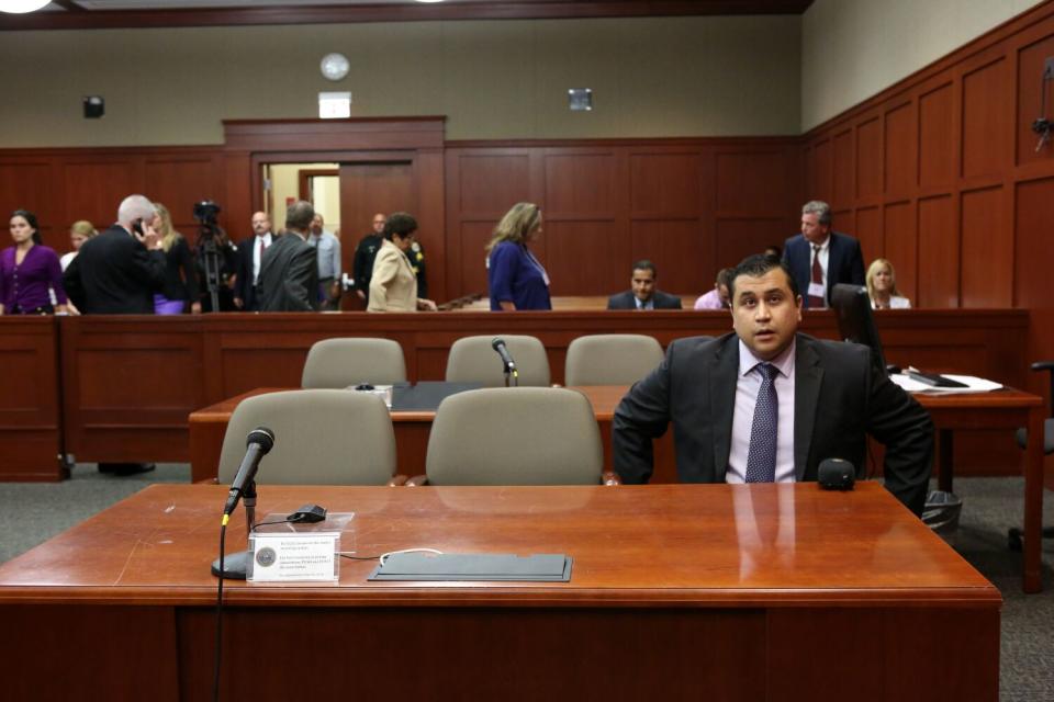 George Zimmerman sits in a courtroom.