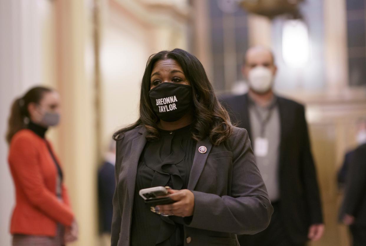 In this Feb. 4, 2021 file photo, Rep. Cori Bush, D-Mo., arrives at the House chamber at the Capitol in Washington.