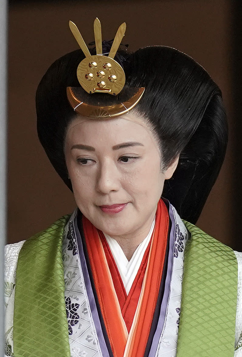 Japanese Empress Masako leaves the ceremony hall after Emperor Naruhito proclaimed his enthronement at the Imperial Palace in Tokyo, Tuesday, Oct. 22, 2019. (Kimimasa Mayama/Pool Photo via AP)