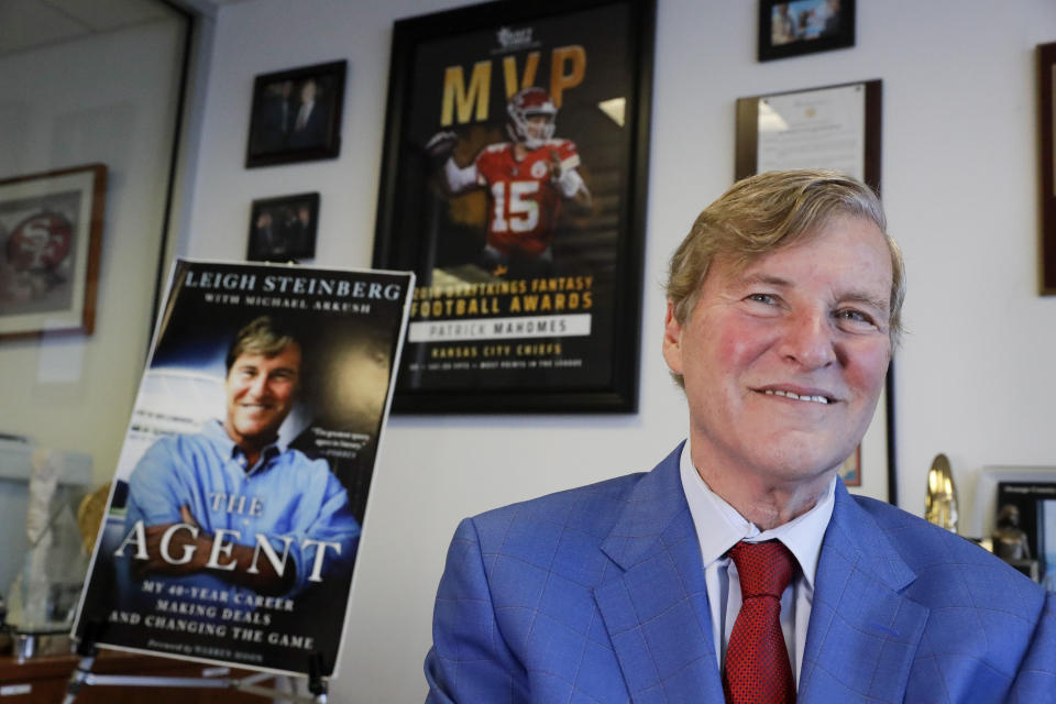 Sports agent Leigh Steinberg poses for a picture at his office Thursday, Feb. 13, 2020, in Newport Beach, Calif. A decade after his personal and professional life bottomed out, Steinberg has another Super Bowl MVP client, saw another former client be elected to the Pro Football Hall of Fame and could have yet another first-round draft pick in the spring. (AP Photo/Chris Carlson)