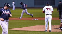 Boston Red Sox pitcher Mike Kickham (74) watches as Atlanta Braves' Adam Duvall, center, rounds the bases on Duvall's two-run home run during the second inning of a baseball game, Wednesday Sept. 2, 2020, in Boston. At left is Braves Austin Riley. (AP Photo/Charles Krupa)