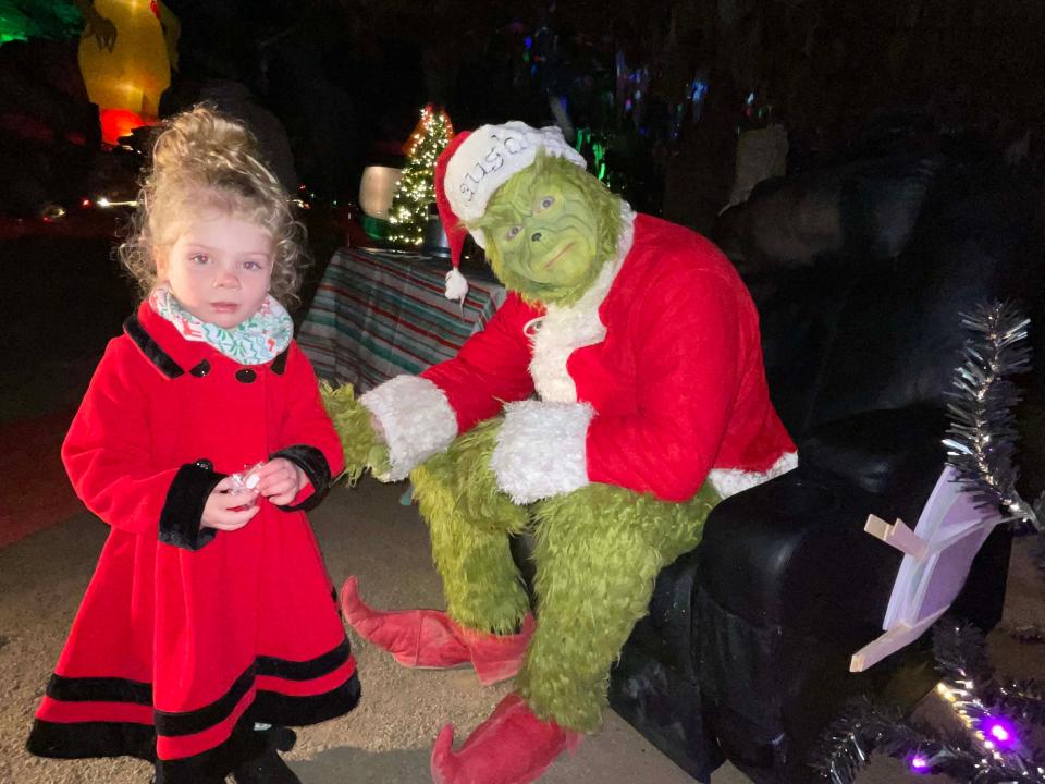 Paislee Washam, 5, is Cindy Lou Who with the Grinch at Christmas in the Cave in the Historical Cherokee Caverns Sunday, Dec. 4, 2022