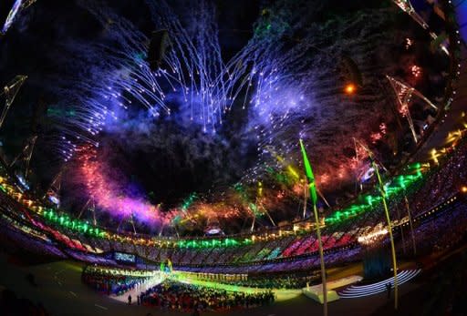 Fireworks explode over the Olympic stadium in London during the closing ceremony of the 2012 London Olympic Games on August 12, 2012. Rio de Janeiro will host the 2016 Olympic Games