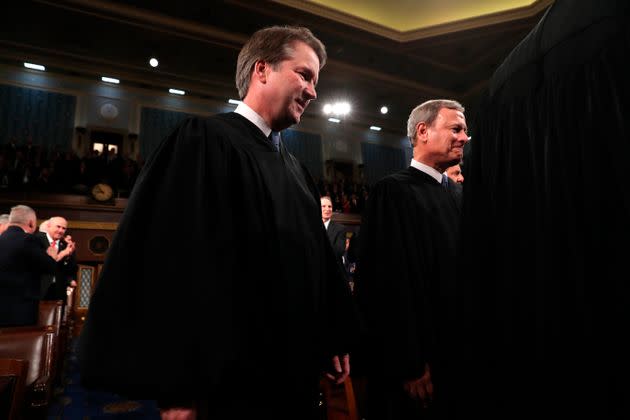 Supreme Court Chief Justice John Roberts, right, and Associate Justice Brett Kavanaugh, left, issued a concurrence in a key gun rights case that stated limits to the majority opinion they joined. (Photo: via Associated Press)