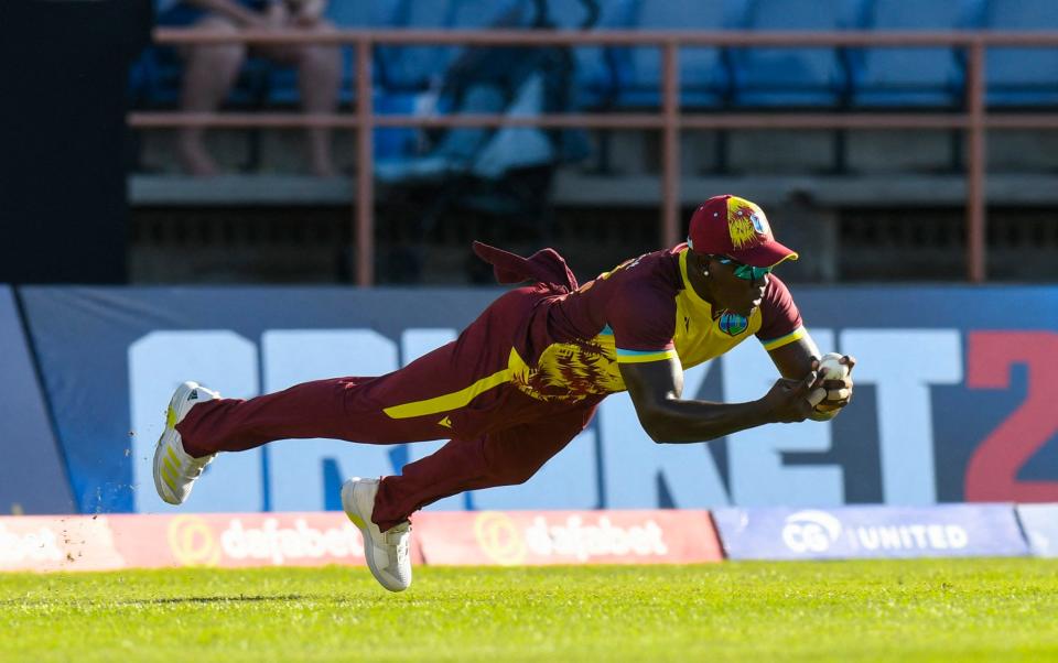 Rovman Powell takes a fine catch to dismiss Phil Salt