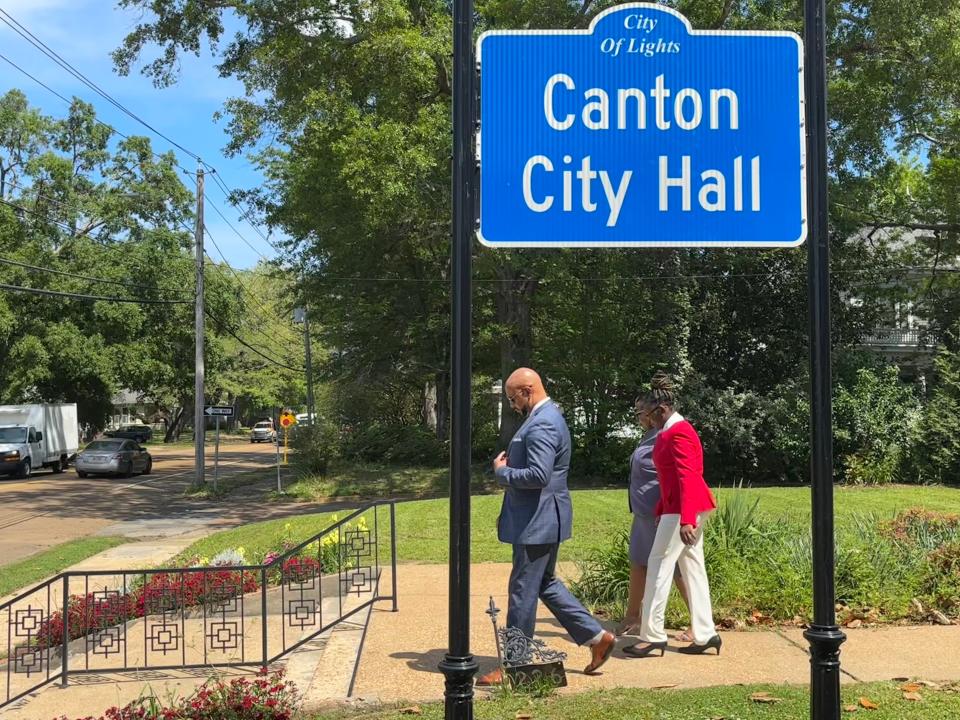 Attorney Carlos Moore, Catanna Francois, and Alexis Davis leave a press conference at Canton City Hall Monday afternoon. Francois alleges she was assaulted by a school resource officer, who is also a Canton police officer.