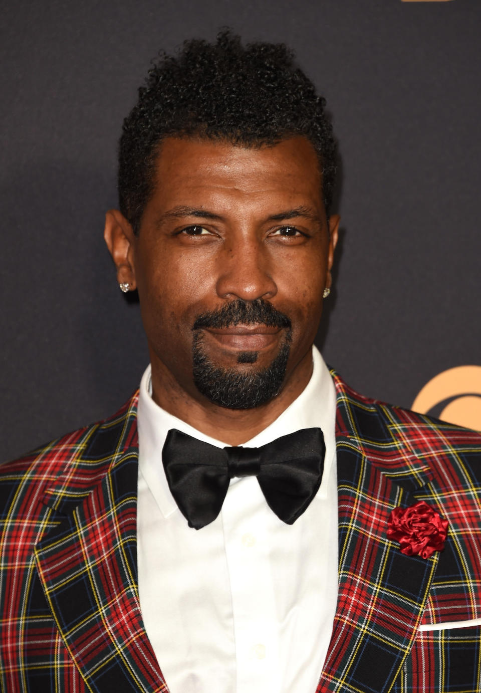 <p>Deon Cole looks like the perfect date with his pillow-soft-looking coils. (Photo: J. Merritt/Getty Images) </p>