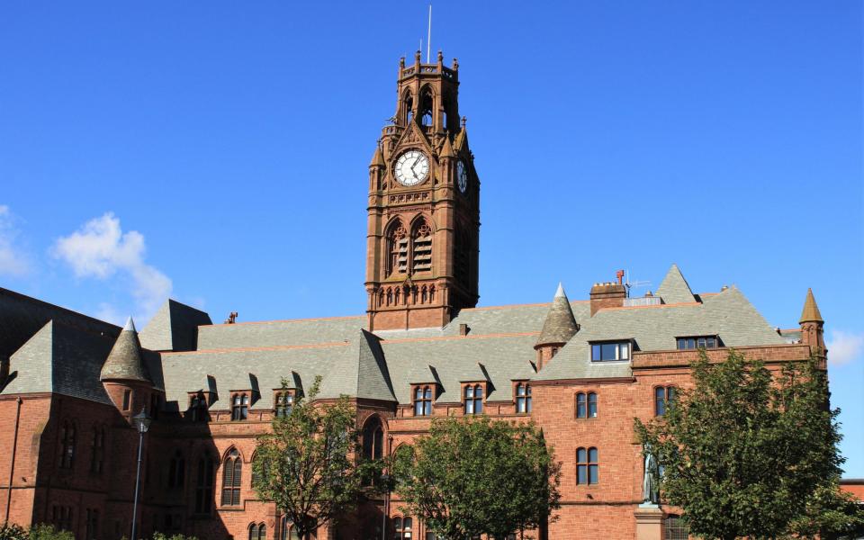 Town Hall and Town Hall clock with blue sky, Barrow In Furness - greenburn / Alamy Stock Photo