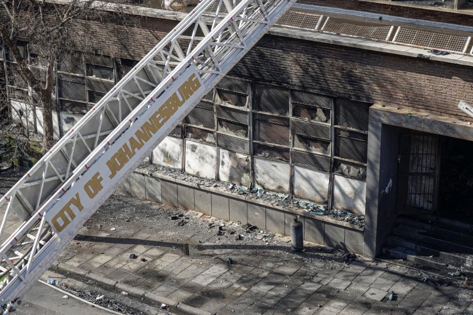 A ladder of a fire engine from the fire department of the City of Johannesburg is seen at the scene of a fire in Johannesburg on 31 August 2023 (AFP via Getty Images)