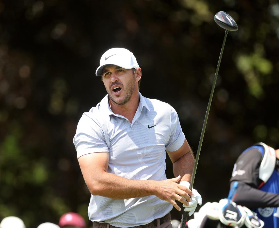Brooks Koepka shouts "fore" after an errant drive on the 6th hole.