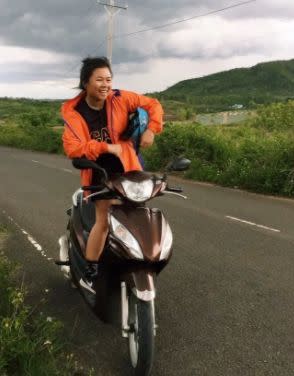 Tran riding her sweet moped. (Photo: Angeline Tu Tran)