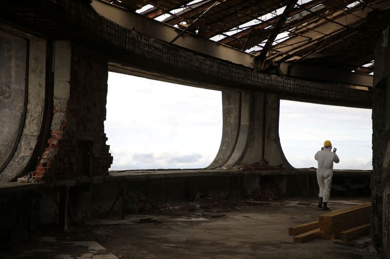 Restorer walks inside the Buzludzha monument in Stara Planina mountain