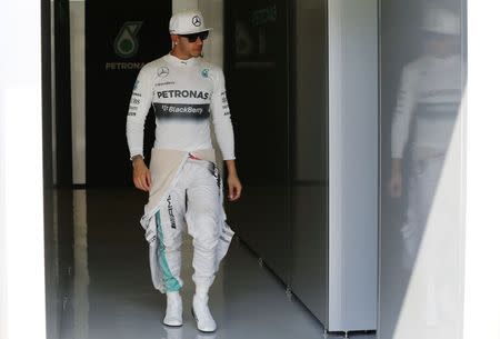 Mercedes Formula One driver Lewis Hamilton of Britain comes out of the pit lane after completed the first practice session of the Abu Dhabi F1 Grand Prix at the Yas Marina circuit in Abu Dhabi November 21, 2014. REUTERS/Ahmed Jadallah