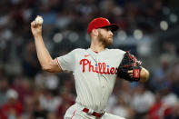 Philadelphia Phillies starting pitcher Zack Wheeler (45) delivers in the first inning of a baseball game against the Atlanta Braves Tuesday, Sept. 28, 2021, in Atlanta. (AP Photo/John Bazemore)