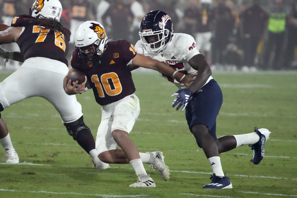 Fresno State defensive lineman Kemari Munier-Bailey (35) sacks Arizona State quarterback Drew Pyne (10) during the first half of an NCAA college football game Saturday, Sept. 16, 2023, in Tempe, Ariz. (AP Photo/Rick Scuteri)