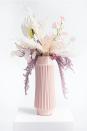 <p>If you're looking to truly impress, this phenomenal <span>Darby Creek Trading Sweet Escape Faux Pampas &amp; Sweet Pea Arrangement in Pink Vase</span> ($229) is something a loved one will cherish. The vase is so chic and can be used over again.</p>