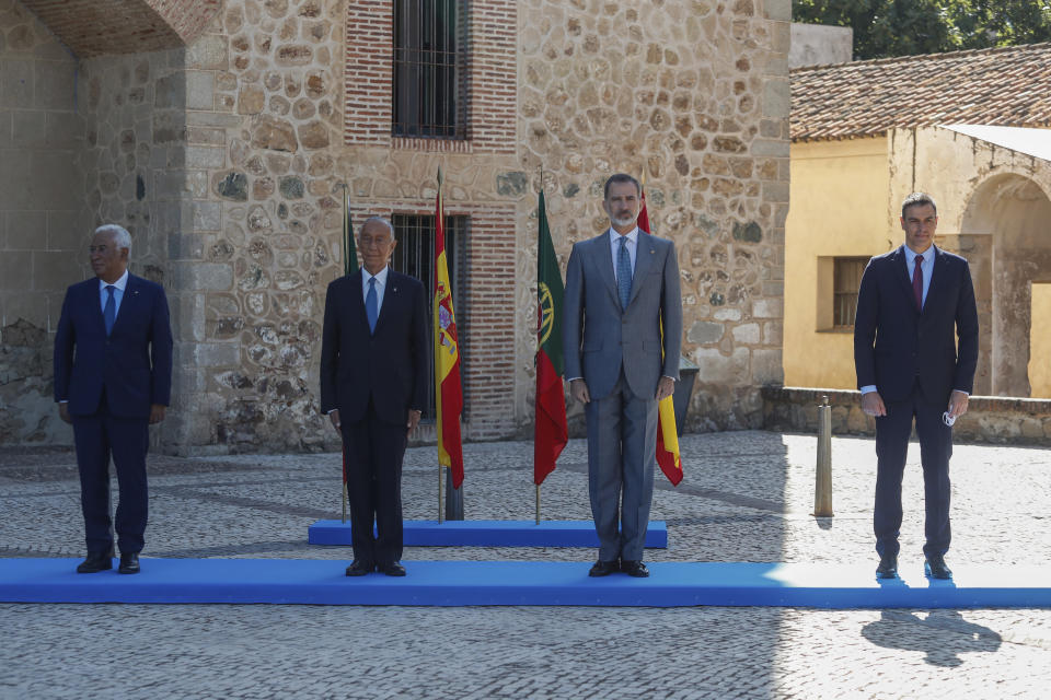 From left to right: Portugal's Prime Minister Antonio Costa, Portugal's President Marcelo Rebelo de Sousa, Spain's King Felipe VI, and Spain's Prime Minister Pedro Sanchez during a ceremony to mark the reopening of the Portugal/Spain border in Badajoz, Spain, Wednesday, July 1, 2020. The border was closed for three and a half months due to the coronavirus pandemic. (AP Photo/Armando Franca)