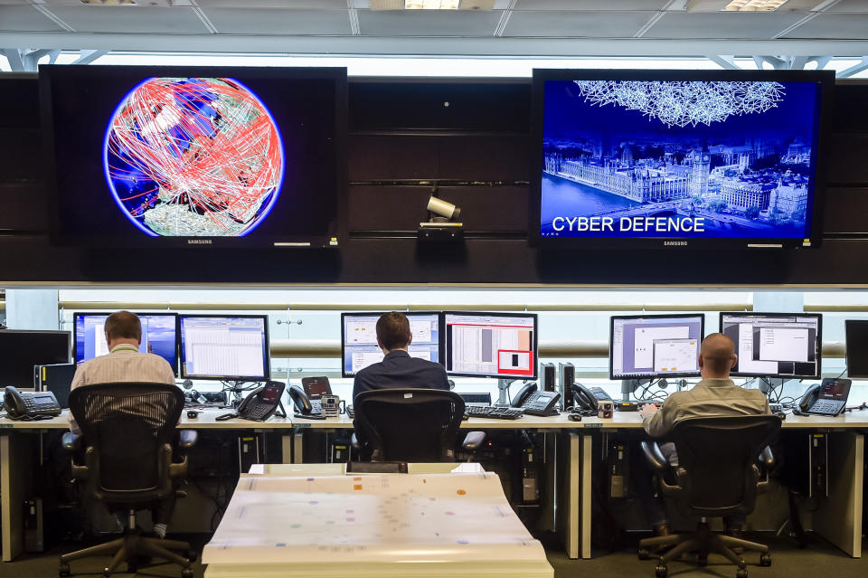 People sit at computers in the 24 hour Operations Room inside GCHQ, Cheltenham in Cheltenham, November 17, 2015. REUTERS/Ben Birchall/Pool