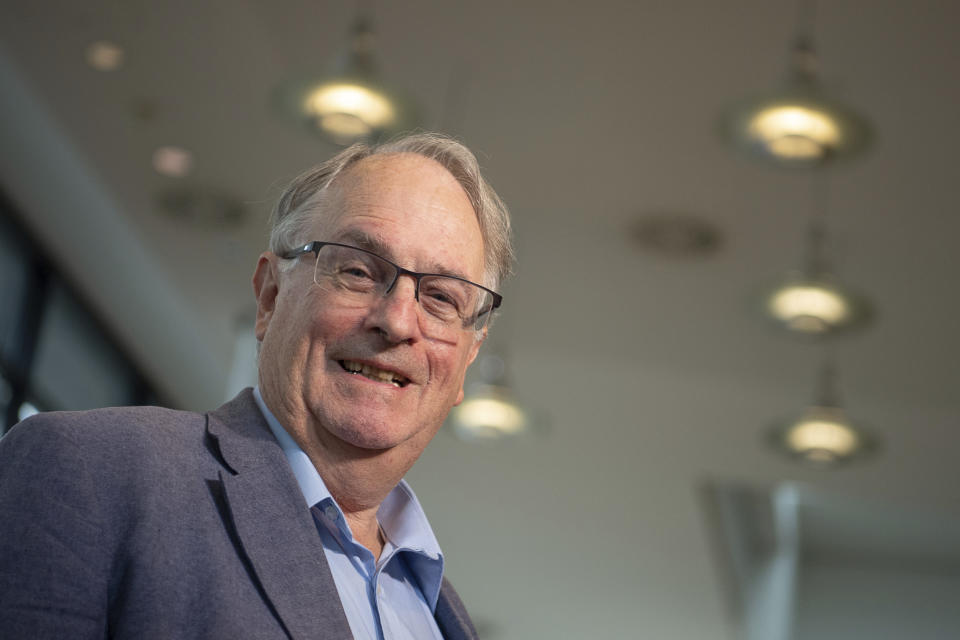 Stanley Whittingham, a British-American chemistry professor at the State University of New York at Binghamton, attends the Advanced Lithium Batteries for Automobile Applications (ABAA) conference in Ulm, Germany, Wednesday, Oct. 9, 2019. Whittingham is one of three scientists who have won this year's Nobel Prize in Chemistry for their contributions to lithium-ion batteries, which have reshaped energy storage and transformed cars, mobile phones and many other devices in an increasingly portable and electronic world. (Sebastian Gollnow/dpa via AP)