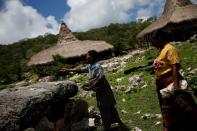 The Wider Image: As crops fail, Indonesia's Sumba seeks lifeline in weaving, fishing