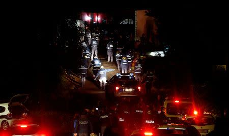 Italian police arrives to confiscate a villa built illegally by an alleged Mafia family in Rome, Italy, November 20, 2018. REUTERS/Yara Nardi