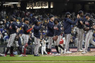 Atlanta Braves celebrates their win against the Milwaukee Brewers in Game 2 of baseball's National League Divisional Series Saturday, Oct. 9, 2021, in Milwaukee. (AP Photo/Morry Gash)