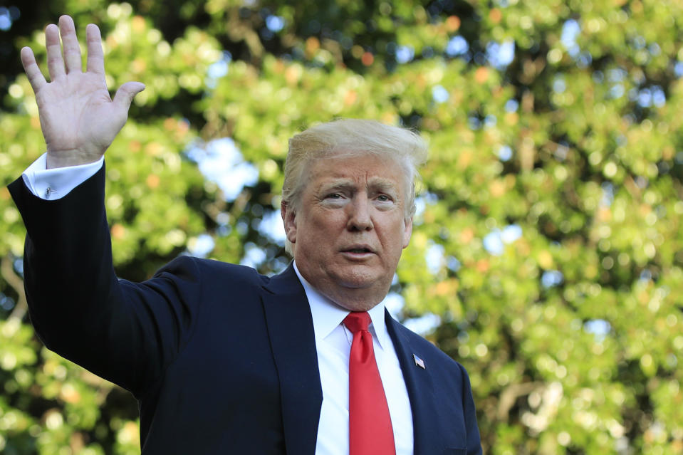 President Donald Trump waves as he leaves after speaking to reporters at the White House in Washington, Saturday, Sept. 29, 2018, for a trip to Wheeling, W.Va. (AP Photo/Manuel Balce Ceneta)