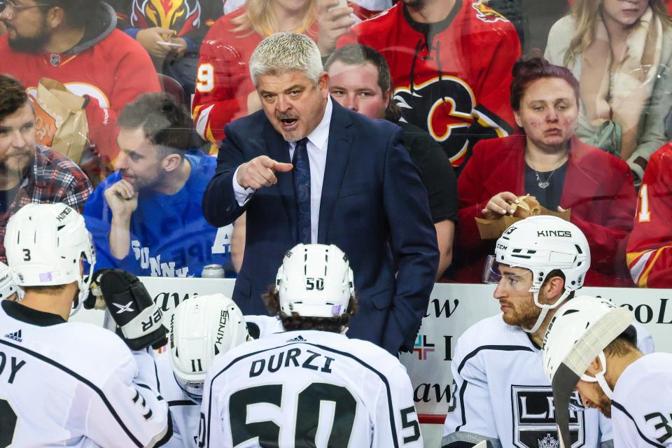 Nov 14, 2022; Calgary, Alberta, CAN; Los Angeles Kings head coach Todd McLellan on his bench against the Calgary Flames during the second period at Scotiabank Saddledome. Mandatory Credit: Sergei Belski-USA TODAY Sports