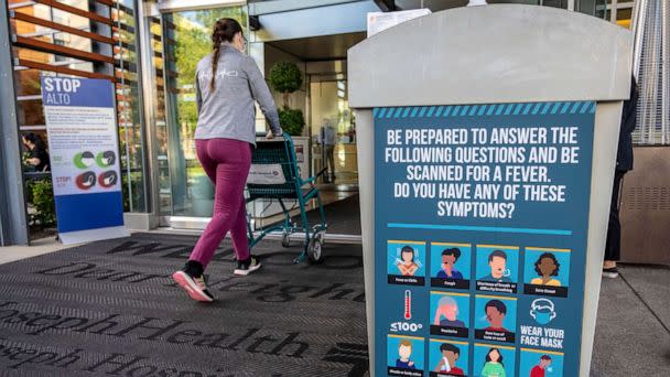 PHOTO: Various signs are posted outside the emergency room entrance at Providence St. Joseph Hospital in Orange, Calif., Nov. 1, 2022.  (MediaNews Group/Orange County Register via Getty Images)