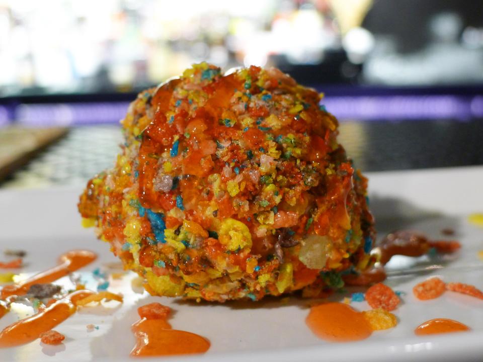 A fried Negroni features ice cream, Campari reduction and Fruity Pebbles at Good News, Darling