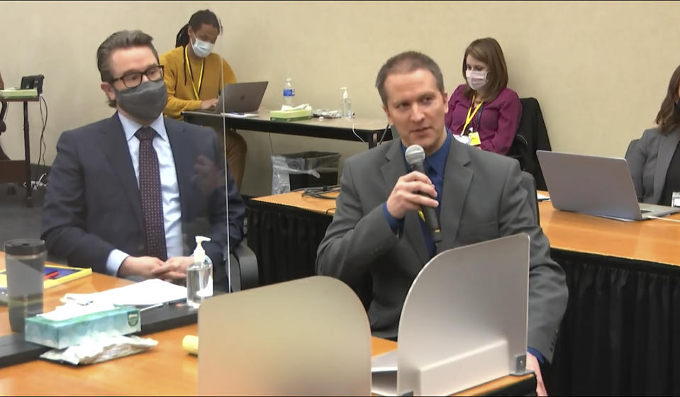 In this image from video, defense attorney Eric Nelson, left, and defendant, former Minneapolis police officer Derek Chauvin address Hennepin County Judge Peter Cahill during motions before the court Thursday, April 15, 2021, in the trial of Chauvin, at the Hennepin County Courthouse in Minneapolis. Chauvin is charged in the May 25, 2020 death of George Floyd. Chauvin told the judge he will not testify on his own behalf. (Court TV via AP, Pool)