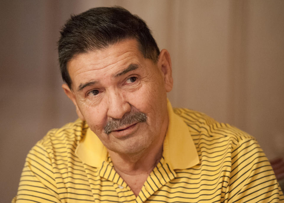 Medal of Honor recipient Santiago Erevia, is photographed on Saturday, Feb. 22, 2014, at his home in San Antonio, Texas. Erevia is one of twenty-four army veterans who will receive the award following a congressionally mandated review conducted to ensure that eligible award recipients were not bypassed due to prejudice. (AP Photo/Darren Abate)