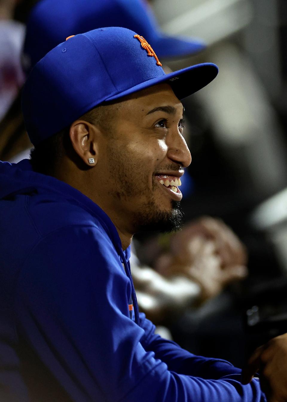 New York Mets' Edwin Diaz looks on from the dugout against the Atlanta Braves during the fifth inning of a baseball game on Sunday, Aug. 13, 2023, in New York.