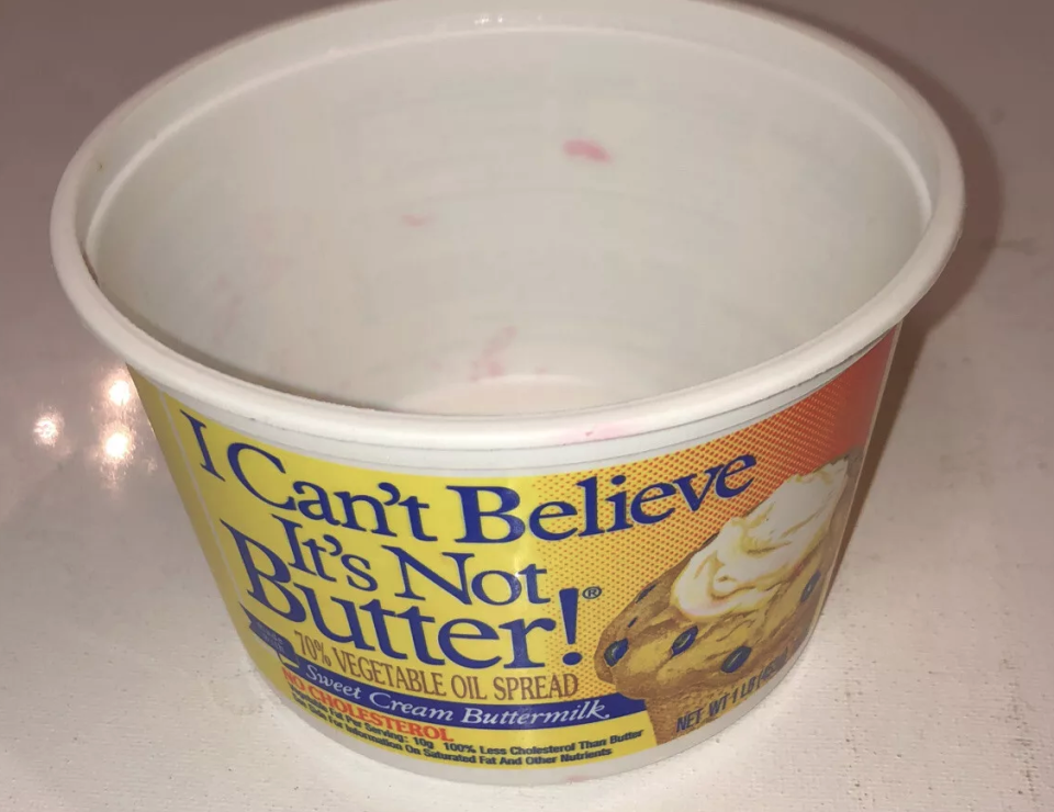 "I Can’t Believe It’s Not Butter!" empty tub, 70% vegetable oil spread, sweet cream buttermilk, net weight 15 oz