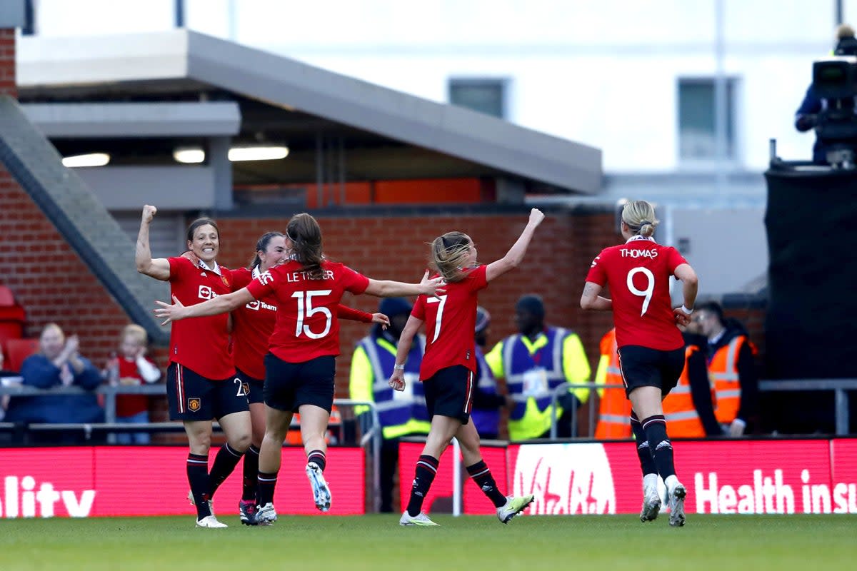 Manchester United’s Rachel Williams (left) celebrates her winner (Will Matthews/PA). (PA Wire)