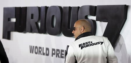Cast member Vin Diesel poses at the premiere of "Furious 7" at the TCL Chinese theatre in Hollywood, California April 1, 2015. REUTERS/Mario Anzuoni