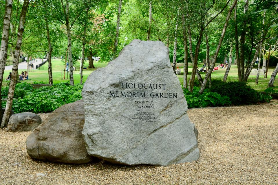London, UK, July 2019. The Holocaust Memorial in Hyde Park, London, designed by Mark Badger, Richard Seifert and Derek Lovejoy. This was the first public memorial in Great Britain dedicated to victims of the Holocaust. This is a garden of boulders surrounded by white-stemmed birch trees, located to the east of The Dell.