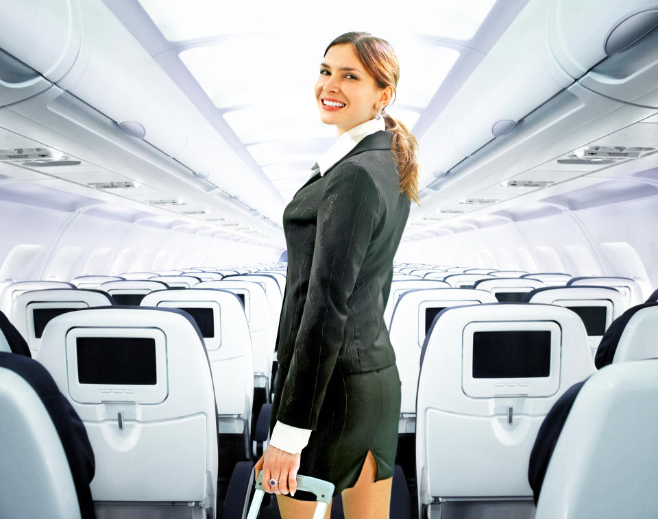 A smiling flight attendant?